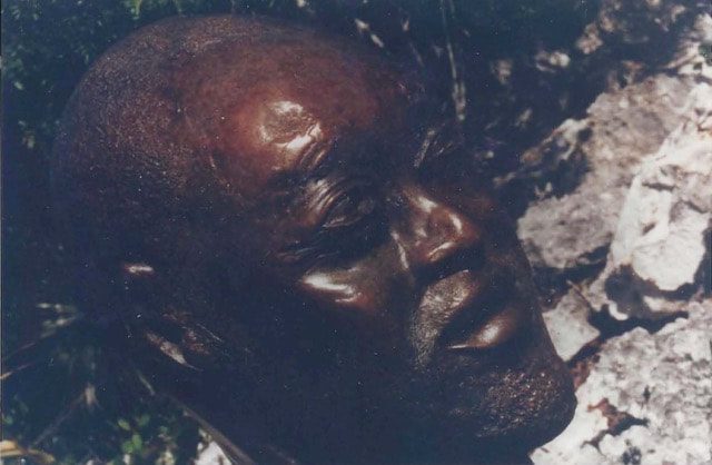 Bronze bust of an Asian man