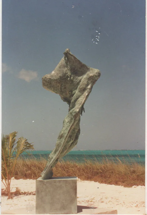 Abstract bronze sculpture of a tall figure